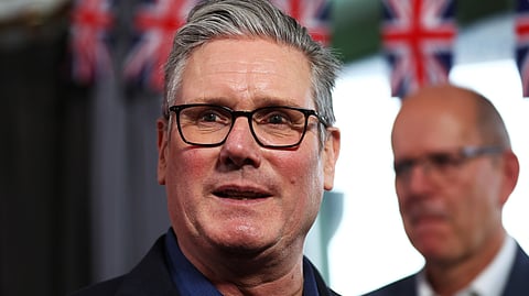 Britain's Prime Minister Keir Starmer talks with members of the audience after delivering a speech at Horntye Park Sports Complex in St Leonards-on-Sea, East Sussex, England, Thursday, Feb. 5, 2026.