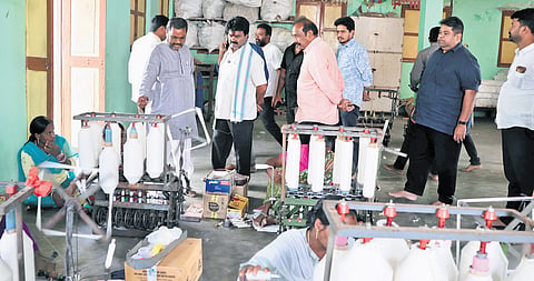Amadalavalasa MLA Koona Ravi Kumar, along with the officials, inspecting the proposed site for the Khadi cluster at Ponduru in Srikakulam district.