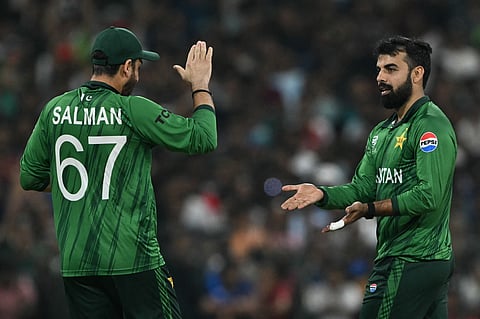 Pakistan's Shadab Khan celebrates with captain Salman Agha after taking the wicket of USA's Shayan Jahangir during the T20 World Cup match between Pakistan and USA at the Sinhalese Sports Club (SSC) Ground in Colombo.