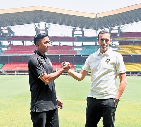 Kerala Blasters head coach David Catala and captain Bikash Singh during a visit to the JLN Stadium on Wednesday