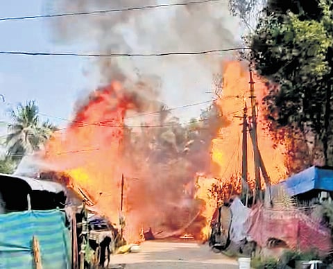 The flames spread rapidly as most houses were covered with plastic sheets and flex banners, intensifying the blaze.