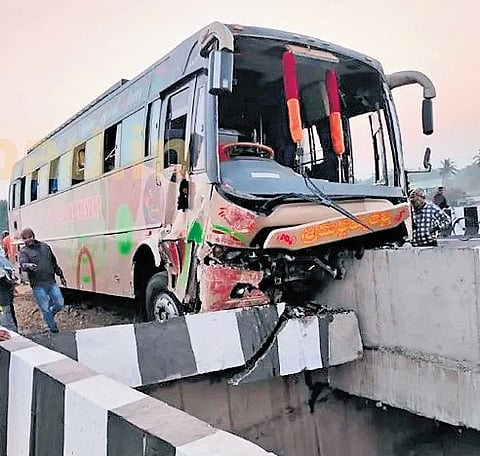 On Bahanaga overbridge, the bus crashed into the retaining wall and was left partially hanging from the bridge.