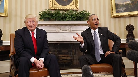 Barack Obama (R) with President Donald Trump in the Oval Office of the White House in Washington.