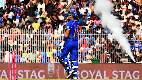 UAE's Muhammad Waseem celebrates his half-century against New Zealand at the MA Chidambaram Stadium, Chennai