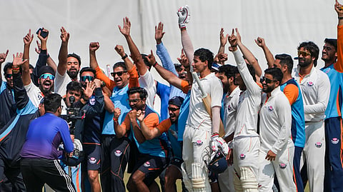 J&K's Vanshaj Sharma with teammates celebrates after the team's victory in the Ranji Trophy semifinal cricket match against Bengal, at the Bengal Cricket Academy Ground, in Kalyani, West Bengal, Wednesday, Feb. 18, 2026.