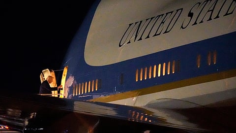 President Donald Trump boards Air Force One, Sunday, Feb. 8, 2026, at Palm Beach International Airport in West Palm Beach, Fla.
