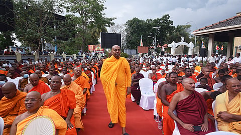Buddhist monks gather to stage a protest demanding more respect from the government, in Colombo, Sri Lanka, Friday, Feb. 20, 2026.