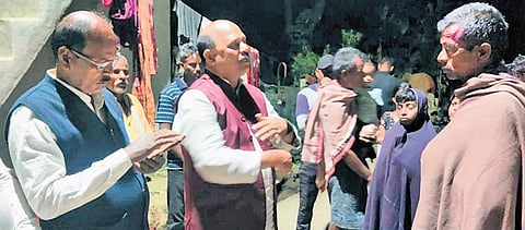 Members of the BJD delegation interacting with kin of the deceased farmer