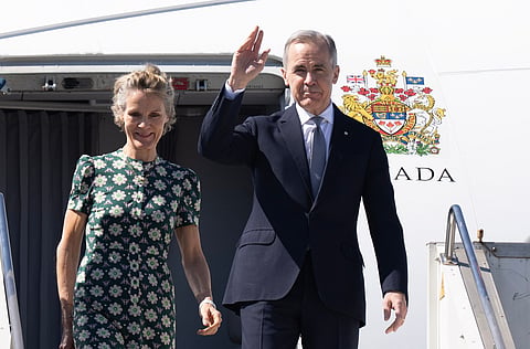 Canadian Prime Minister Mark Carney and Diana Fox Carney arrive in Mumbai, India, Friday, Feb. 27, 2026.