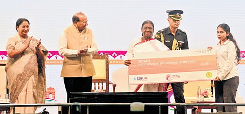 President Droupadi Murmu at the launch; CM and L-G also present.