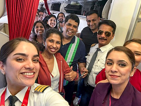 Passengers and crew of an Air India flight from Dubai arrive in New Delhi on Tuesday. (Photo | @AirIndia_News/X)