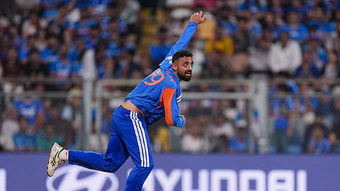 India's Varun Chakravarthy bowls a delivery during the ICC Men's T20 World Cup 2026 second semifinal cricket match between India and England, at the Wankhede Stadium, in Mumbai, Maharashtra, Thursday, March 5, 2026.