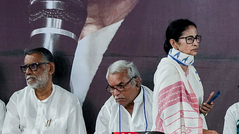 West Bengal Chief Minister Mamata Banerjee stages a sit-in for the second consecutive day to protest against the alleged arbitrary deletions from the post-SIR electoral rolls in the state, in Kolkata, Saturday, March 7, 2026.