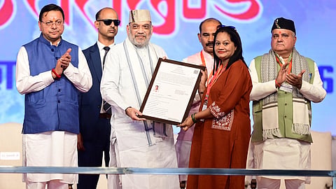 Union Home Minister Amit Shah and Uttarakhand Chief Minister Pushkar Singh Dhami (L) during a gathering in Haridwar.