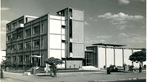 Photograph of the road facing the classroom wing of the Main building