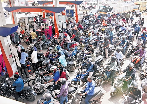 Motorists throng a petrol bunk in Velachery, Chennai, on Thursday