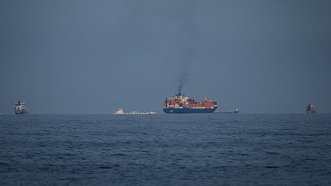 Cargo ships line up in the Strait of Hormuz