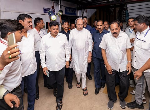 Biju Janata Dal (BJD) chief Naveen Patnaik, centre, visits SCB Medical College and Hospital following a massive fire in the trauma care department, in Cuttack, Odisha on March 16, 2026,
