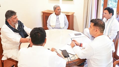 AICC general secretary Randeep Singh Surjewala, Chief Minister Siddaramaiah, Deputy Chief Minister DK Shivakumar and others hold a meeting in Bengaluru on Friday.