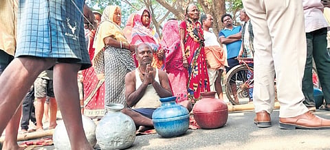 Patapur villagers staging blockade on Trisulia-Banki road in protest against water crisis in their area, on Monday