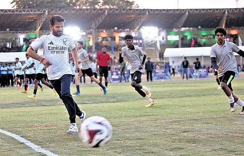Chief Minister A Revanth Reddy plays football during the Legislators Sports and Cultural Meet at LB Stadium on Saturday
