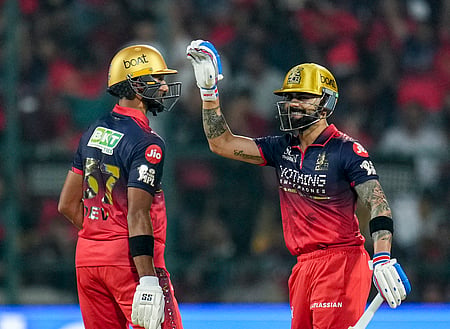 Royal Challengers Bengaluru's Devdutt Padikkal, left, and Virat Kohli during an Indian Premier League (IPL) 2026 T20 cricket match between Sunrisers Hyderabad