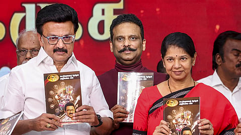 DMK President and Tamil Nadu Chief Minister MK Stalin, left, party leader Kanimozhi Karunanidhi, right, with others during the release of party manifesto.