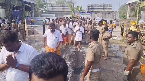 Union Minister of State L Murugan performed a fire walk and worshipped the Goddess on the occasion of the annual Kundam festival on Tuesday.