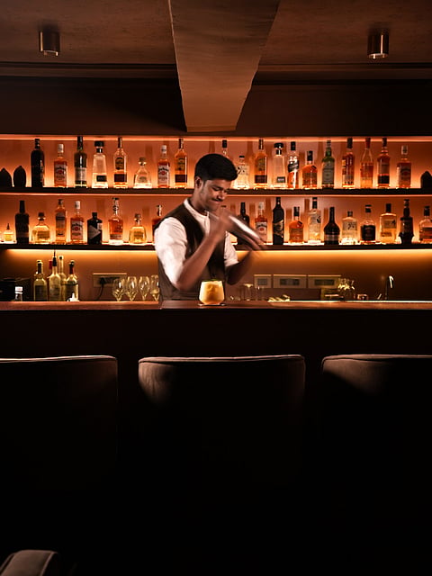 At POD, a bartender getting ready for the night