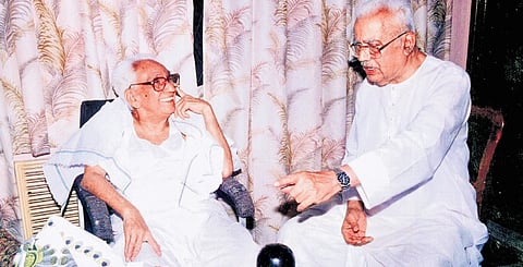 K Karunakaran and E K Nayanar engaged in conversation