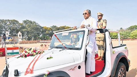 Chief Minister Siddaramaiah takes the guard of honour during the Police Flag Day and medal presentation ceremony in Bengaluru on Thursday