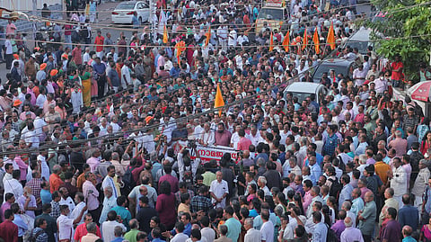 People in the Nama Japa Yatra taken out by NSS Thiruvananthapuram taluk union in protest against Speaker A N Shamseer's remarks on science and myth, from Palayam Ganapathy temple to Pazhavangadi Ganapathy temple.