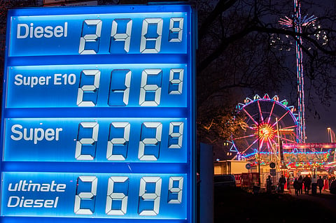 Gas prices are displayed near a ferris wheel in Frankfurt, Germany, Thursday, April 2, 2026.