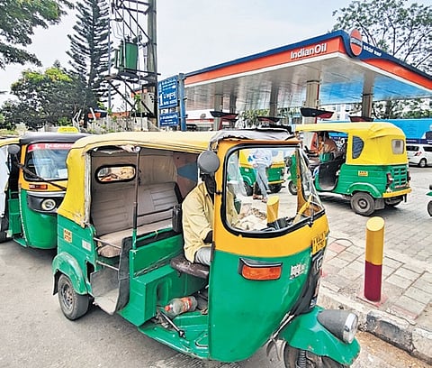 Autori-ckshaws queue up for LPG at a station amid a supply crisis in Bengaluru on Sunday