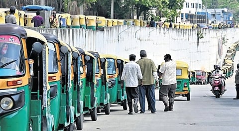 Autorickshaws queue outside a refuel station in Kengeri Satellite Town