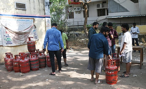 People collect LPG Gas cylenders at Telangana Civil suplies Indian Gas Godown in Hyderabad
