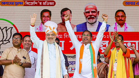 Union Home Minister Amit Shah addresses with party leaders during an election campaign ahead of the Assam Assembly elections, in Patharkandi.