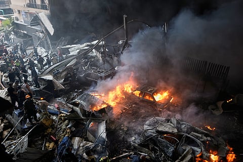 First responders work at the site of an Israeli airstrike that struck an apartment building in Beirut, Lebanon, Wednesday, April 8, 2026.