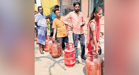 Consumers queuing up at Indane distributor Prasanna Gas Agency’s office in Korattur