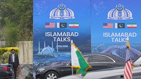 A Pakistani official is seen during the arrival of the U.S. Vice President JD Vance for talks with Iranian officials in Islamabad, Pakistan, Saturday, April 11, 2026.