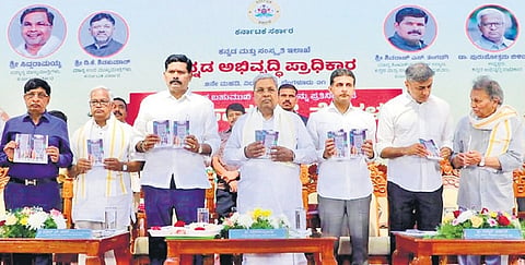 CM Siddaramaiah with Minister for Kannada and Culture Shivaraj Tangadagi, Shivajinagar MLA Rizwan Arshad and others during a book release event on Kannada Samarasya Nelegalu at Vidhana Soudha on Wednesday.