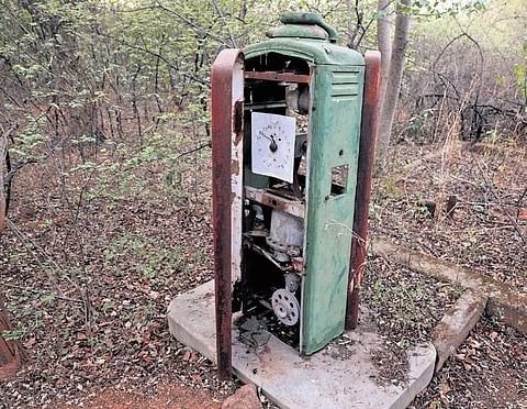 The mechanised petrol dispensing unit inside the Chiran Palace estate and inset, the maker’s name affixed to the casing