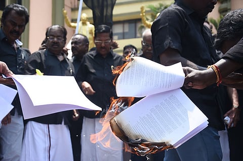 DMK cadres stage a protest in Chennai, burning copies of the Delimitation Bill in condemnation
