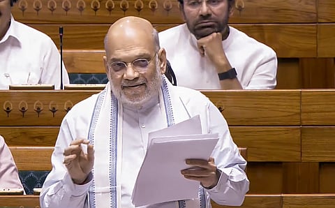 Union Home Minister Amit Shah speaks in the Lok Sabha during the Special session of Parliament, in New Delhi, Friday, April 17, 2026.