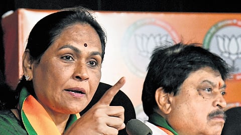 MoS for Labour and Employment Shobha Karandlaje gestures as she addresses the media at the state BJP office in Nampally, Hyderabad on Sunday