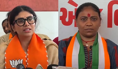 BJP MLA Rivaba Jadeja (L) and her sister-in-law Naynaba Jadeja campaigning got the BJP and Congress respectively.