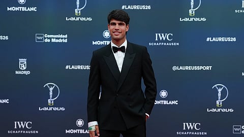 Tennis player Carlos Alcaraz poses as he arrives for the 2026 Laureus World Sports Awards ceremony in Madrid, Spain, Monday, April 20, 2026.