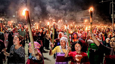 ‘Meira paibis’ (torch-bearers) hold a protest against the Tronglaobi killing incident in Imphal