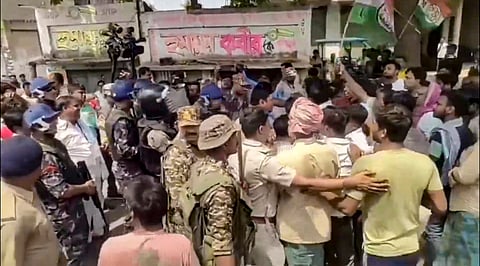 Security personnel present at the site after clashes broke out between supporters of the Aam Janata Unnayan Party (AJUP) and the ruling TMC during the first phase of the West Bengal Assembly elections, at Naoda, in Murshidabad district, Thursday, April 23, 2026.