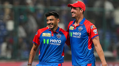 Mitchell Starc (R) was Delhi Capitals' leading pace bowler last season, claiming 14 wickets in 11 matches.
